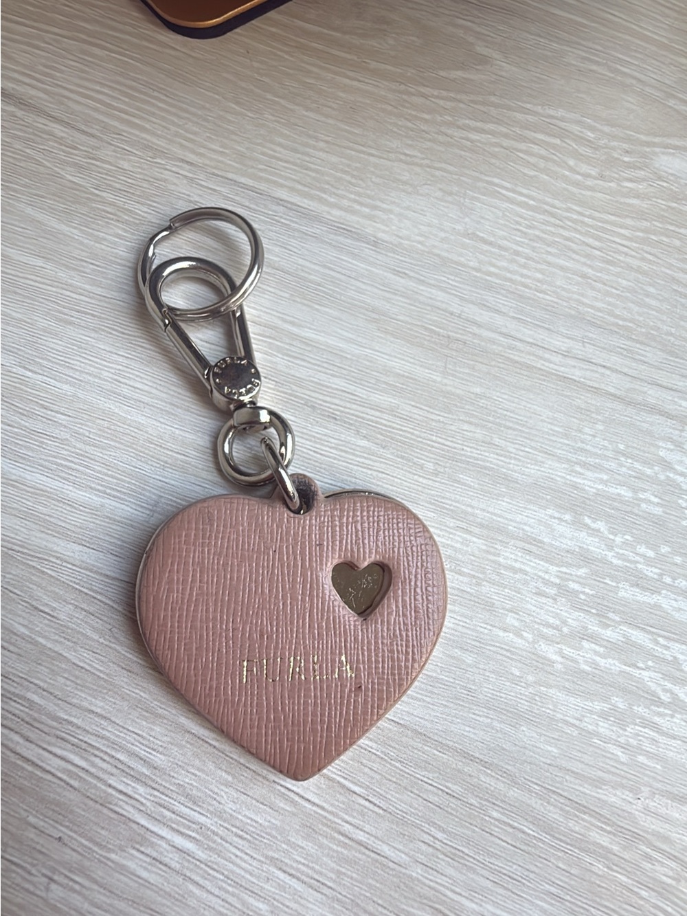 Furla light pink silver tone key chain